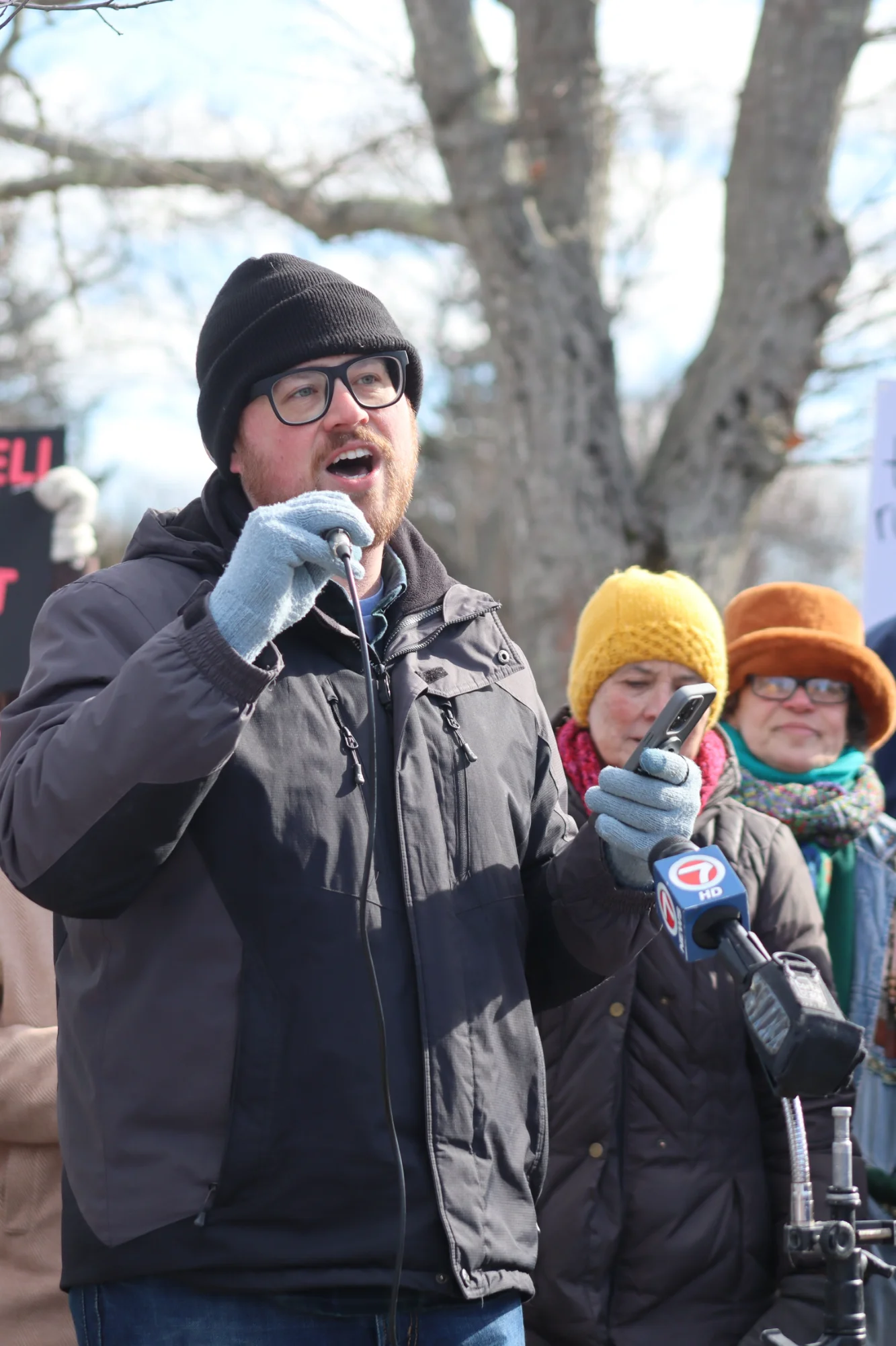 Justin Evans speaking at rally